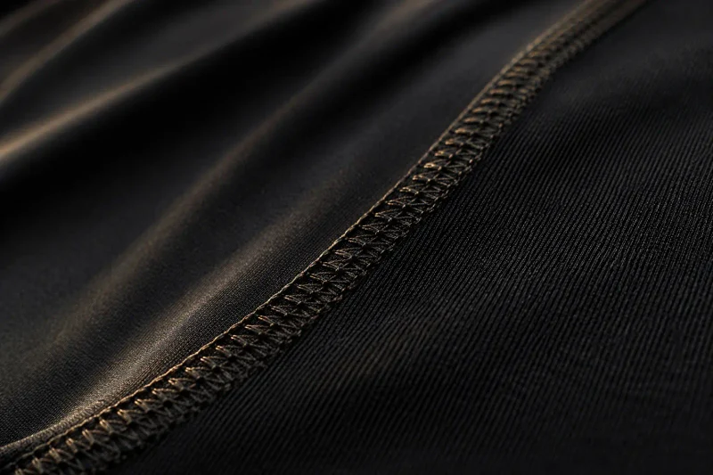 Close-up of flatlock seam on compression fabric